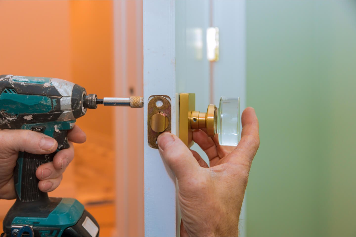 closeup-of-a-professional-locksmith-installing-or-2021-08-29-01-06-56-utc.jpg