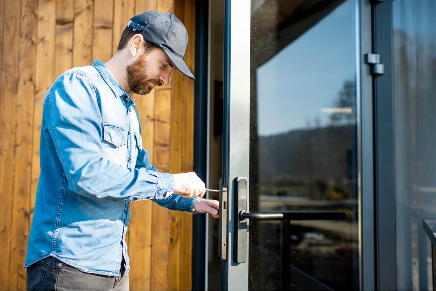 man-repairing-door-lock-2021-09-02-06-24-34-utc.jpg
